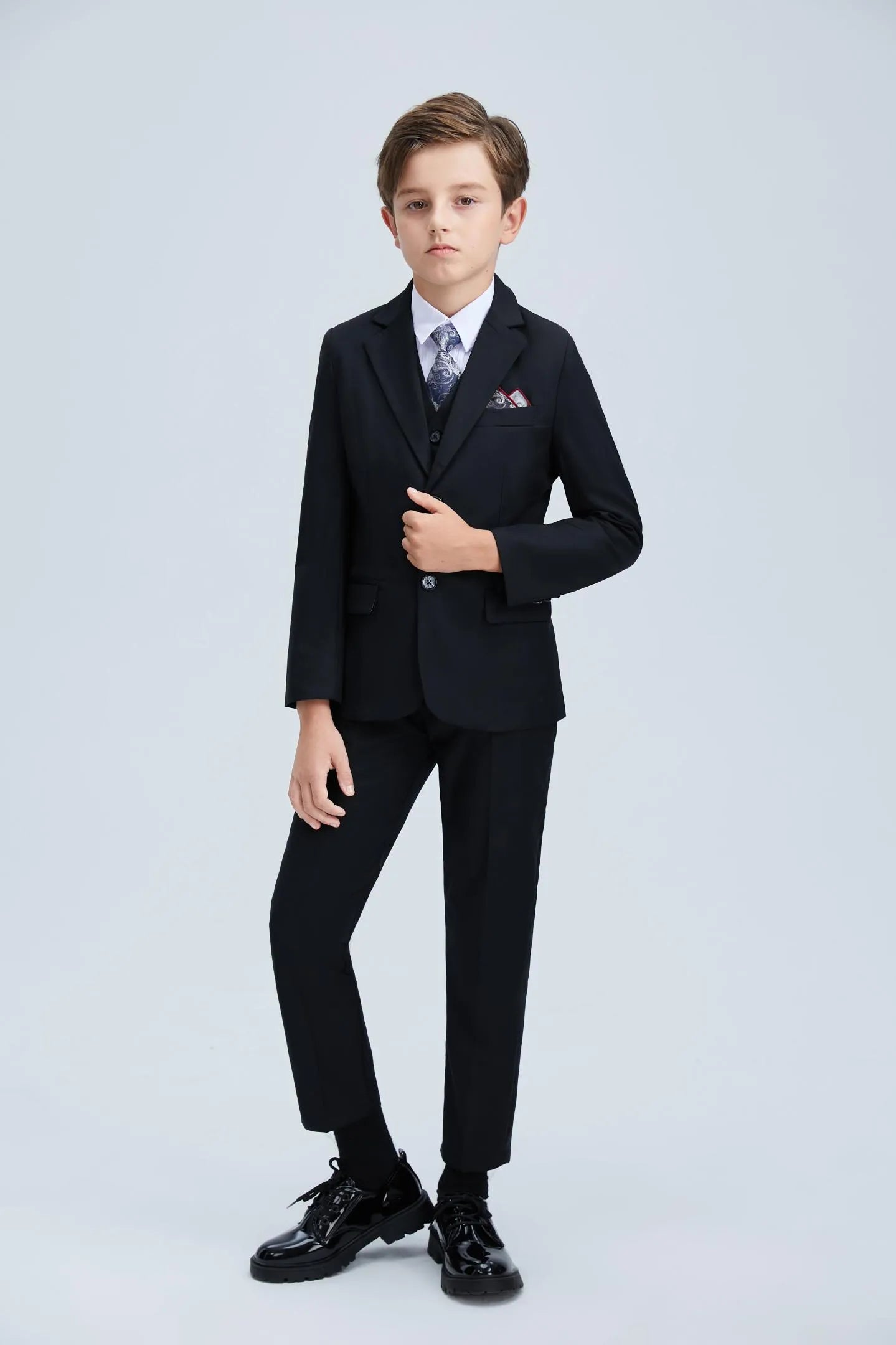 Boys' black tuxedo suit with vest and tie for wedding or formal party wear