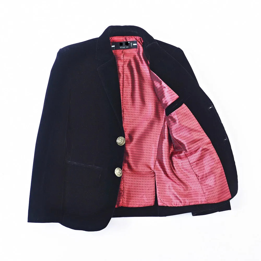 Inside view of black velvet formal boys blazer featuring red patterned silk lining and real interior pockets.
