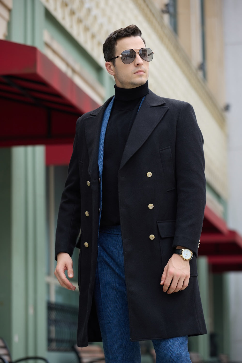 Man wearing black wool double breasted overcoat with turtleneck – winter street fashion look