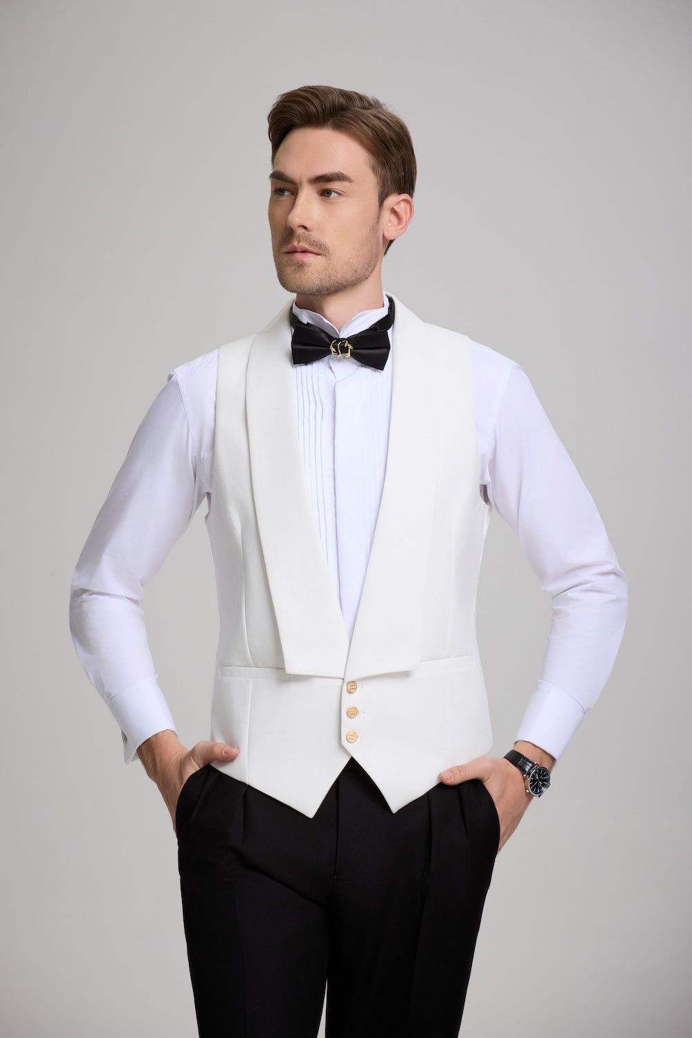Close-up of white shawl collar vest and pleated shirt – 3 piece tuxedo suit with formal details