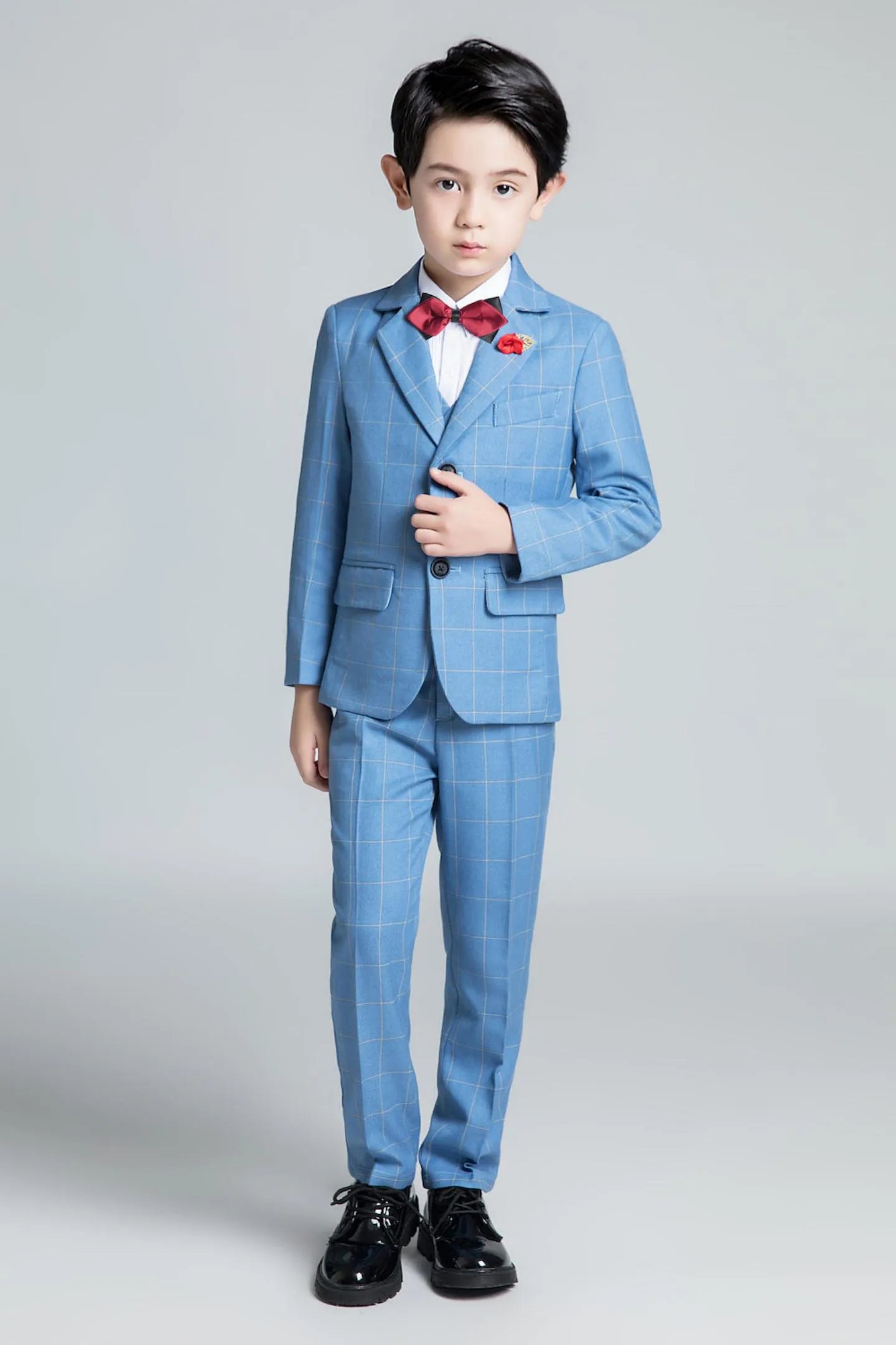 Light blue plaid boys formal suit with red bow tie and blazer for weddings