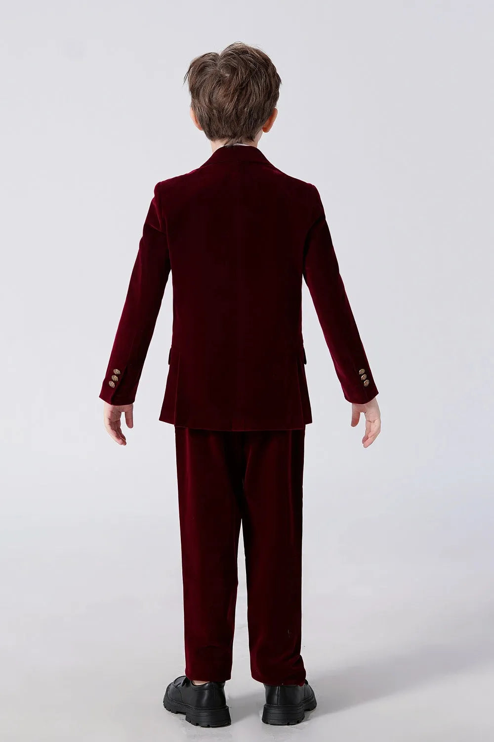 Back view of burgundy velvet jacket and pants – stylish boys' suit for formal parties and special occasions