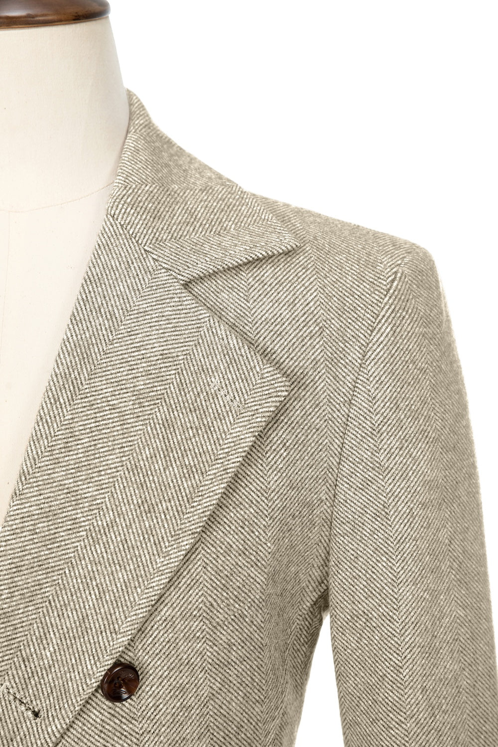 Champagne close-up of lapel detail on double-breasted wool coat