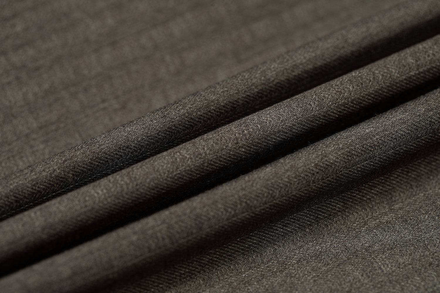Texture detail of pinstripe suit fabric in close-up fold