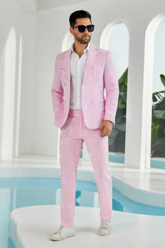 Dark pink-white seersucker suit with striped blazer and pants styled for summer events