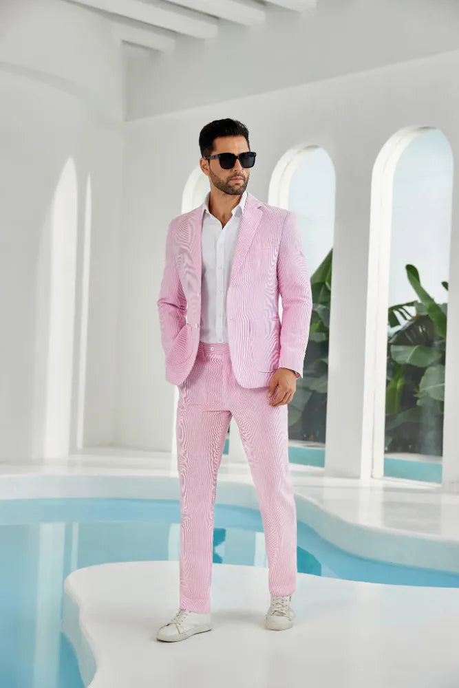Dark pink-white seersucker suit with striped blazer and pants styled for summer events