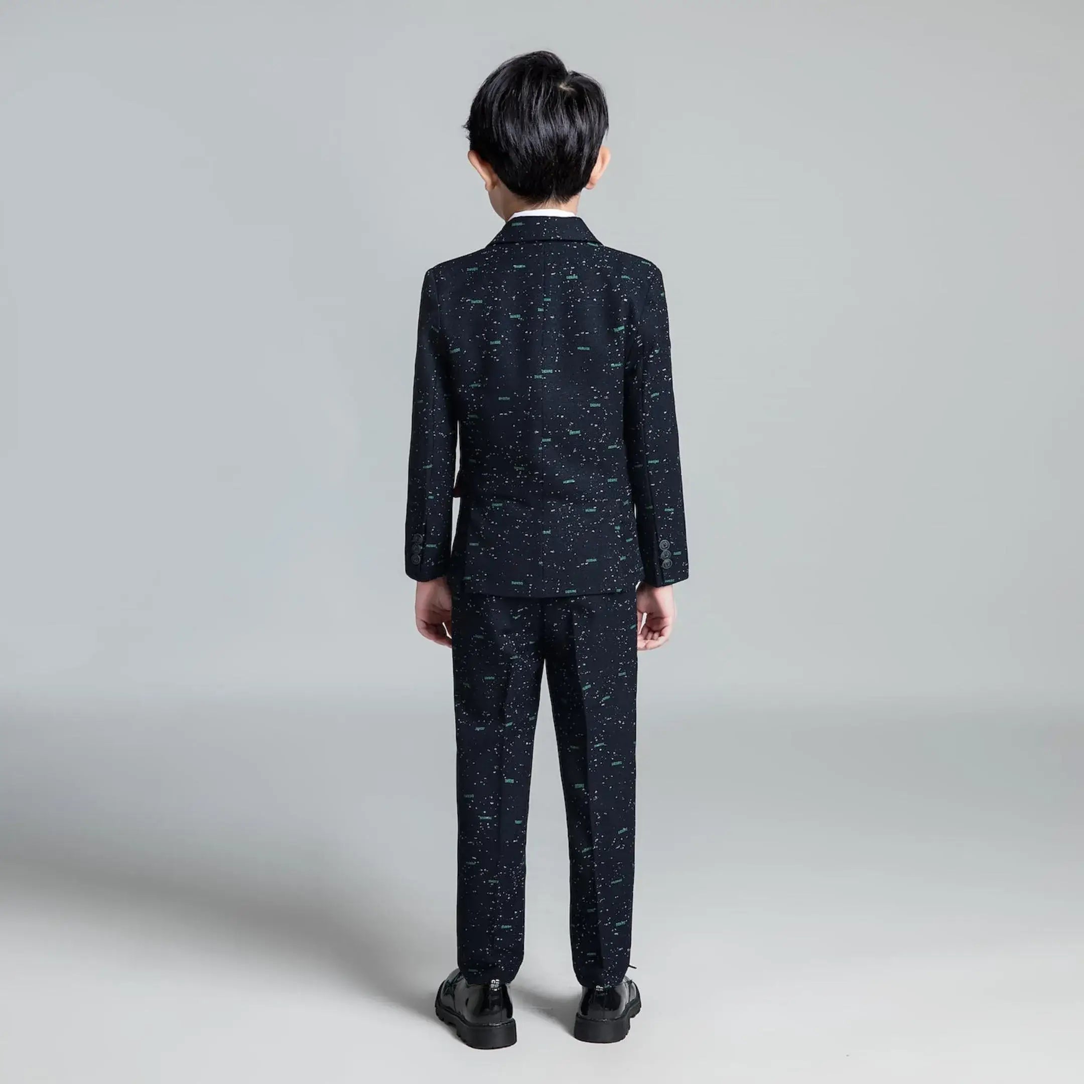 Back view of printed slim fit boys' suit with modern detailing, ideal for formal parties and special occasions