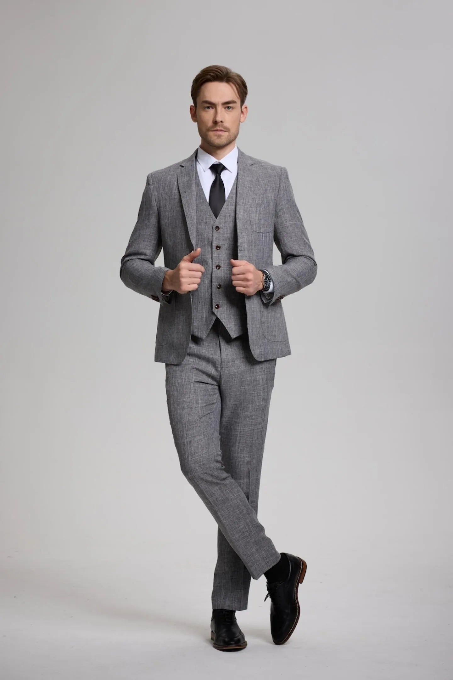 full view of men's dark grey formal 3-piece suit with vest and blazer – perfect for weddings, business, and prom events.