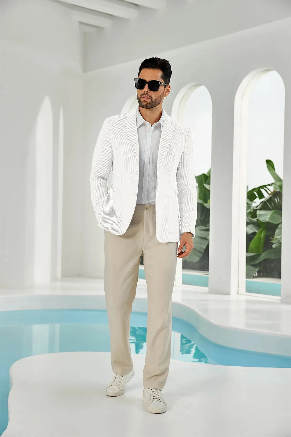 Full white seersucker striped men's summer blazer on model