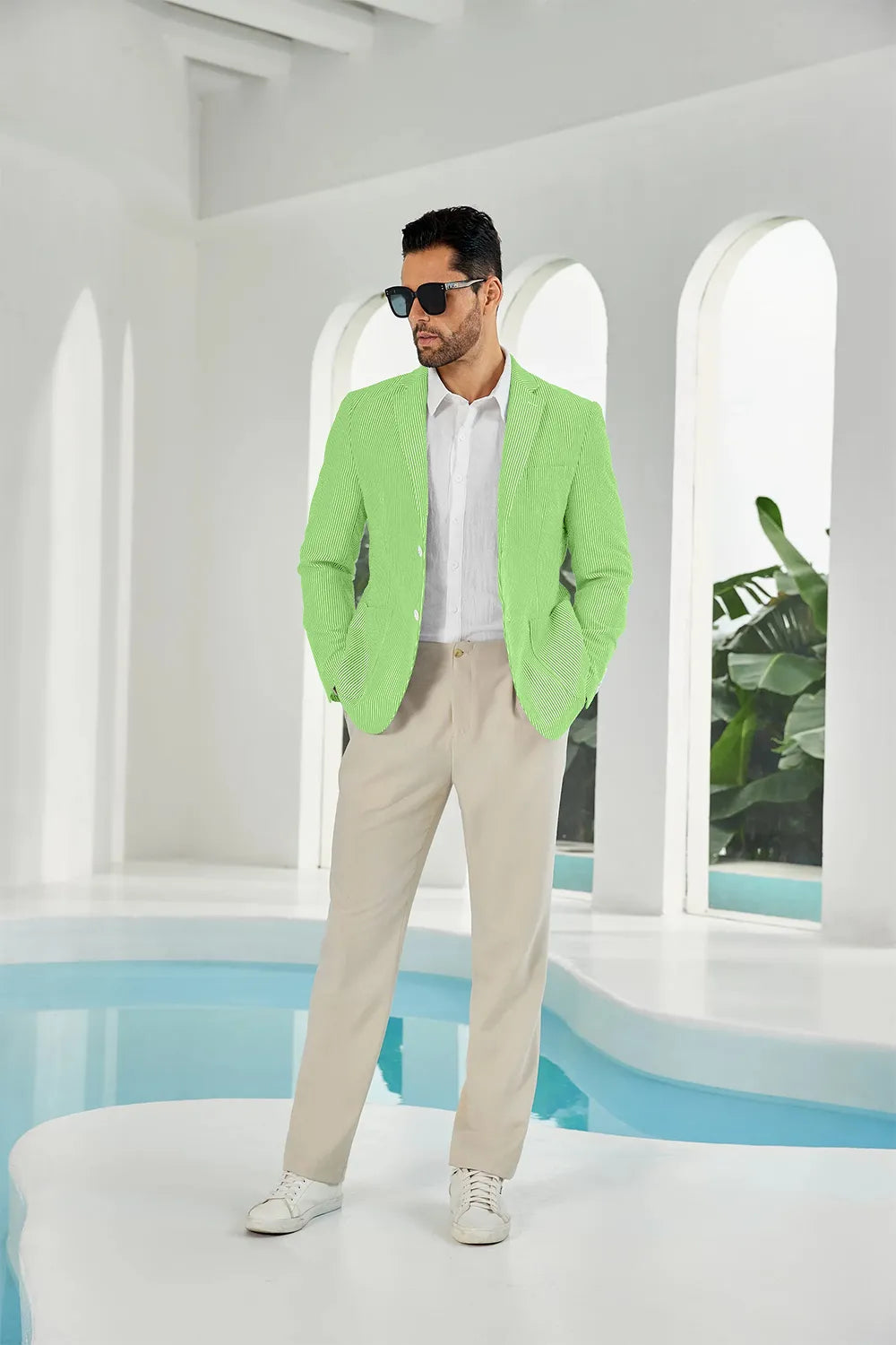 Green-white seersucker striped men's summer blazer on model