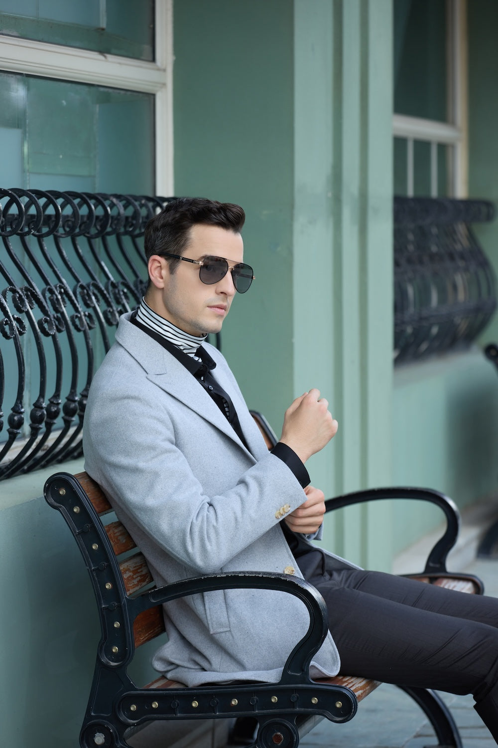 Men's light gray wool blend overcoat - gold button cuffs, formal casual long coat for men in outdoor street scene