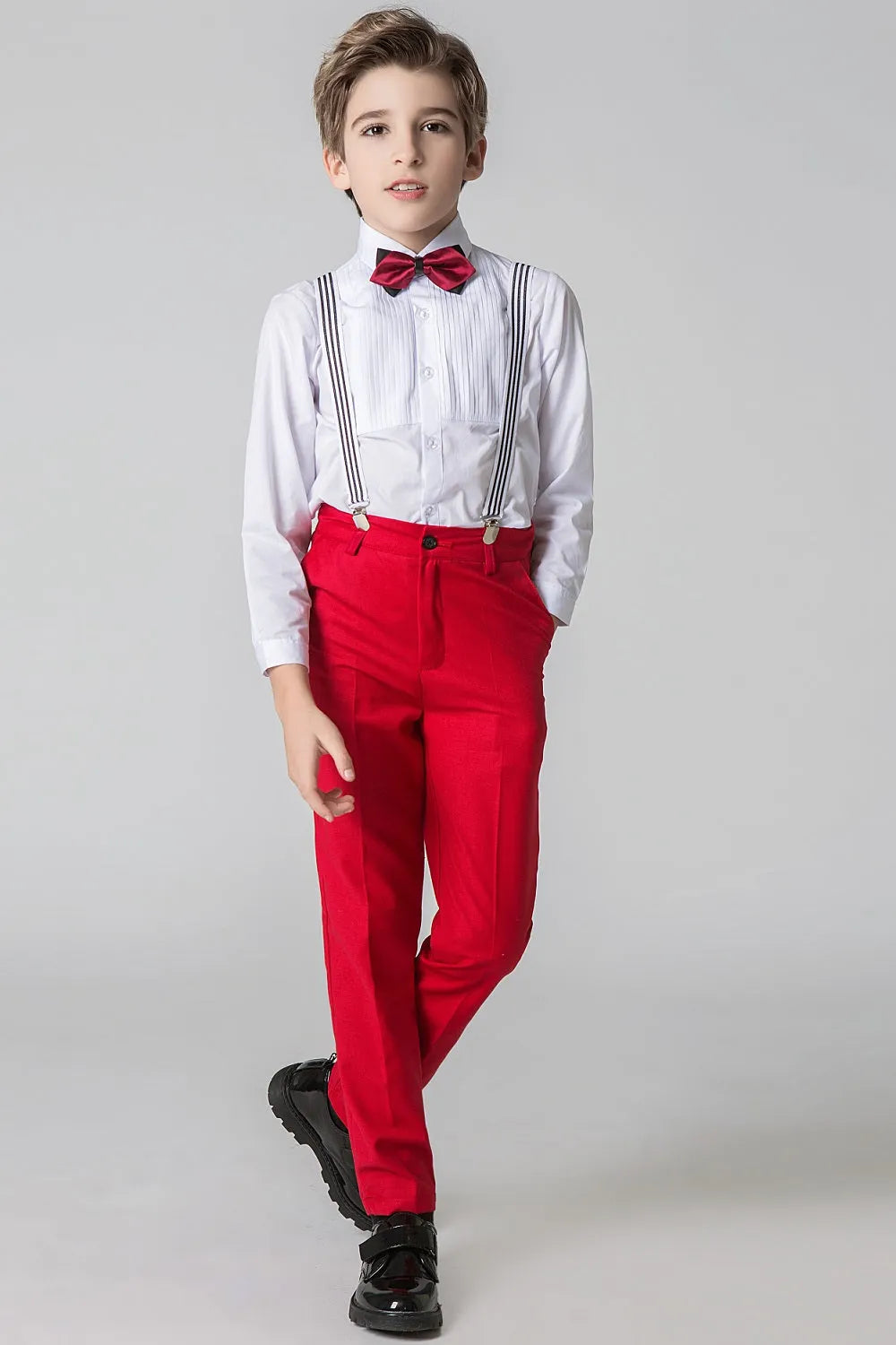 Red boys' prom pants with striped suspenders & burgundy bow tie