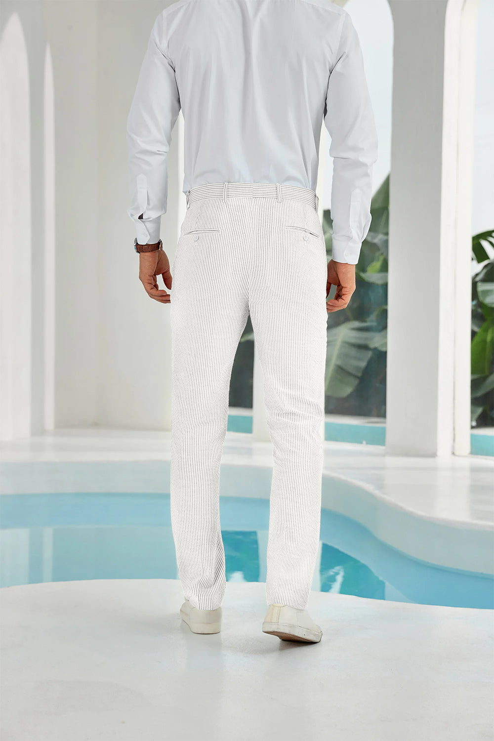 Back view showing rear pockets on ivory white striped seersucker pants