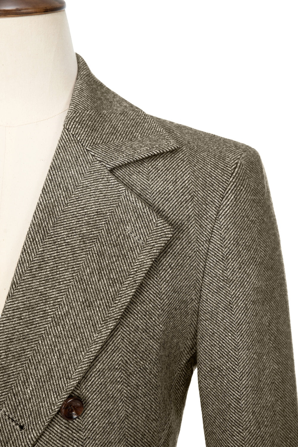 Khaki close-up of lapel detail on double-breasted wool coat