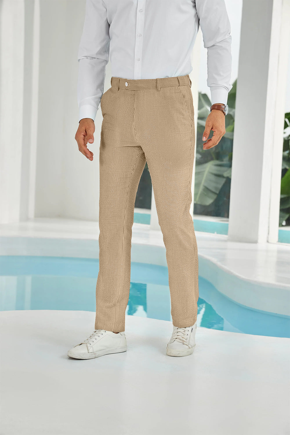 Front view of khaki seersucker pants with subtle stripes and white shirt