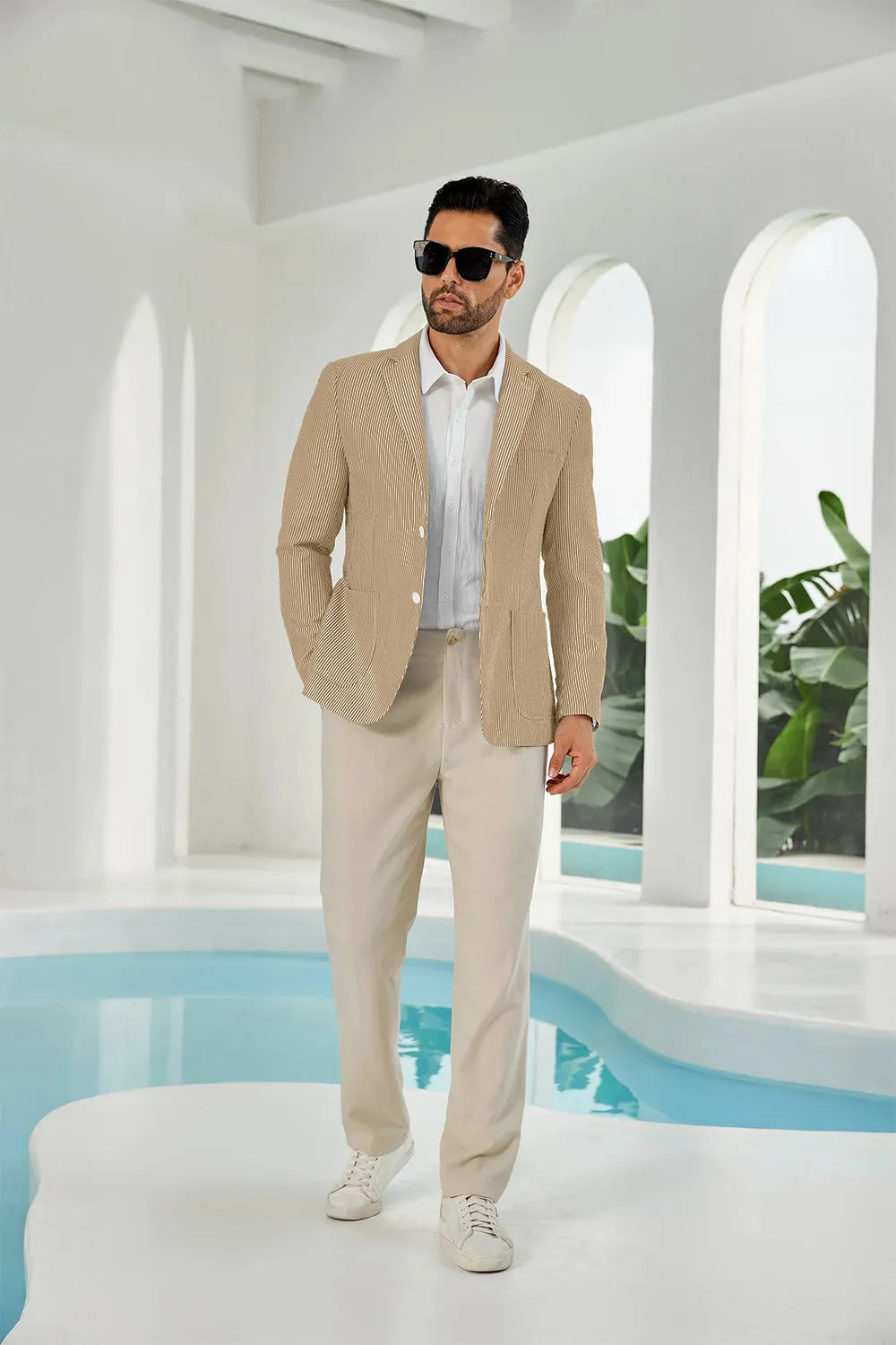 Khaki-white seersucker striped men's summer blazer on model