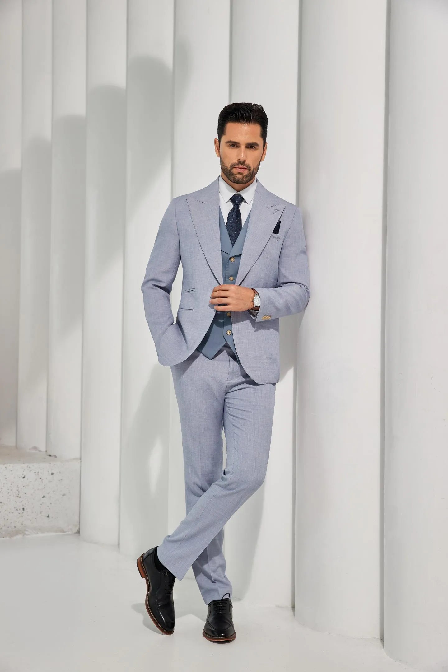 full view of men's light blue summer 2-piece suit, including blazer and pants, perfect for casual events and warm weather.