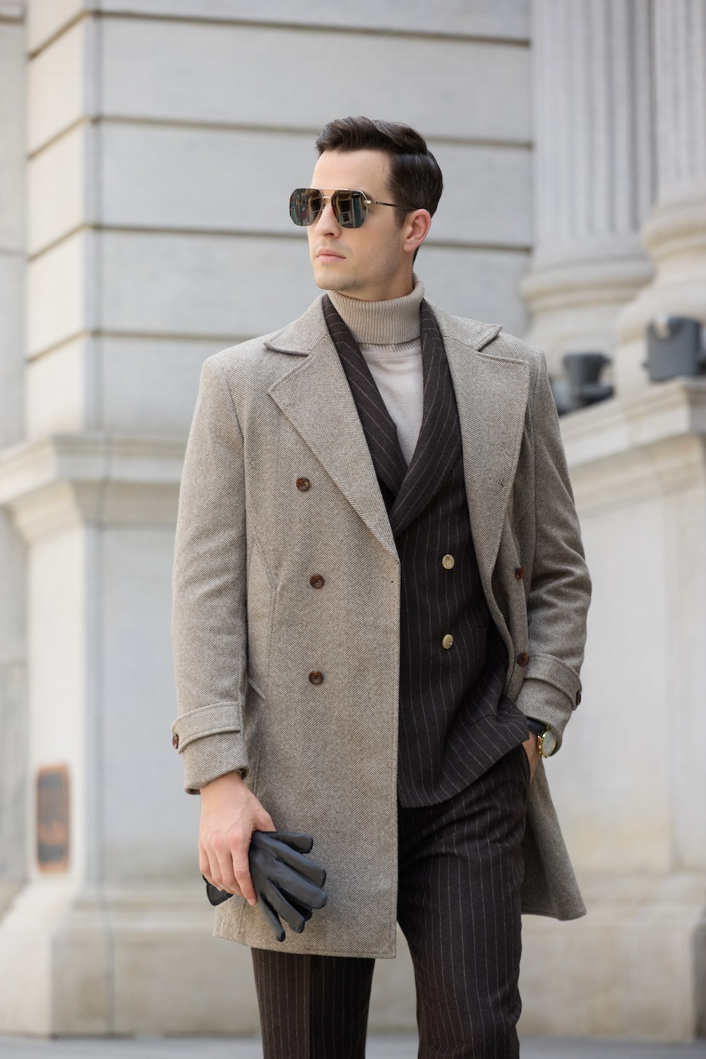 Light coffee wool coat for men – double-breasted style with gloves in hand