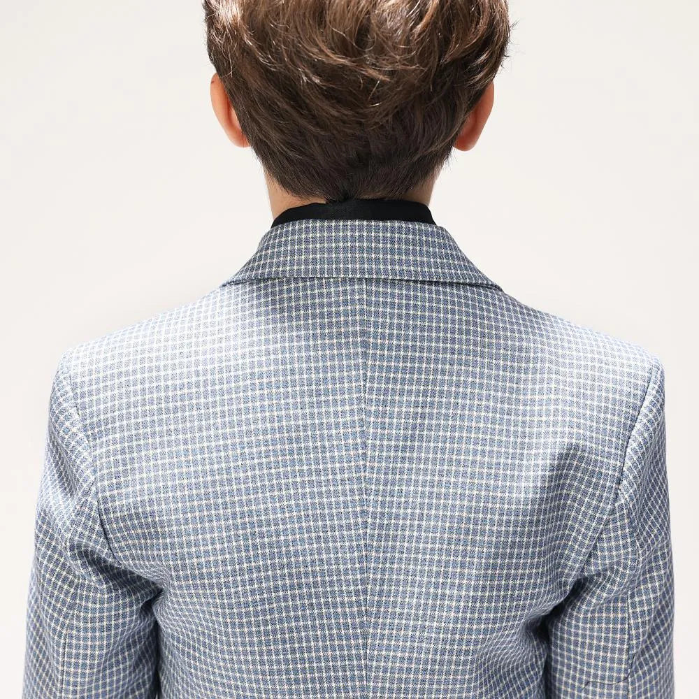 Back collar detail of elegant boys' checkered formal suit jacket