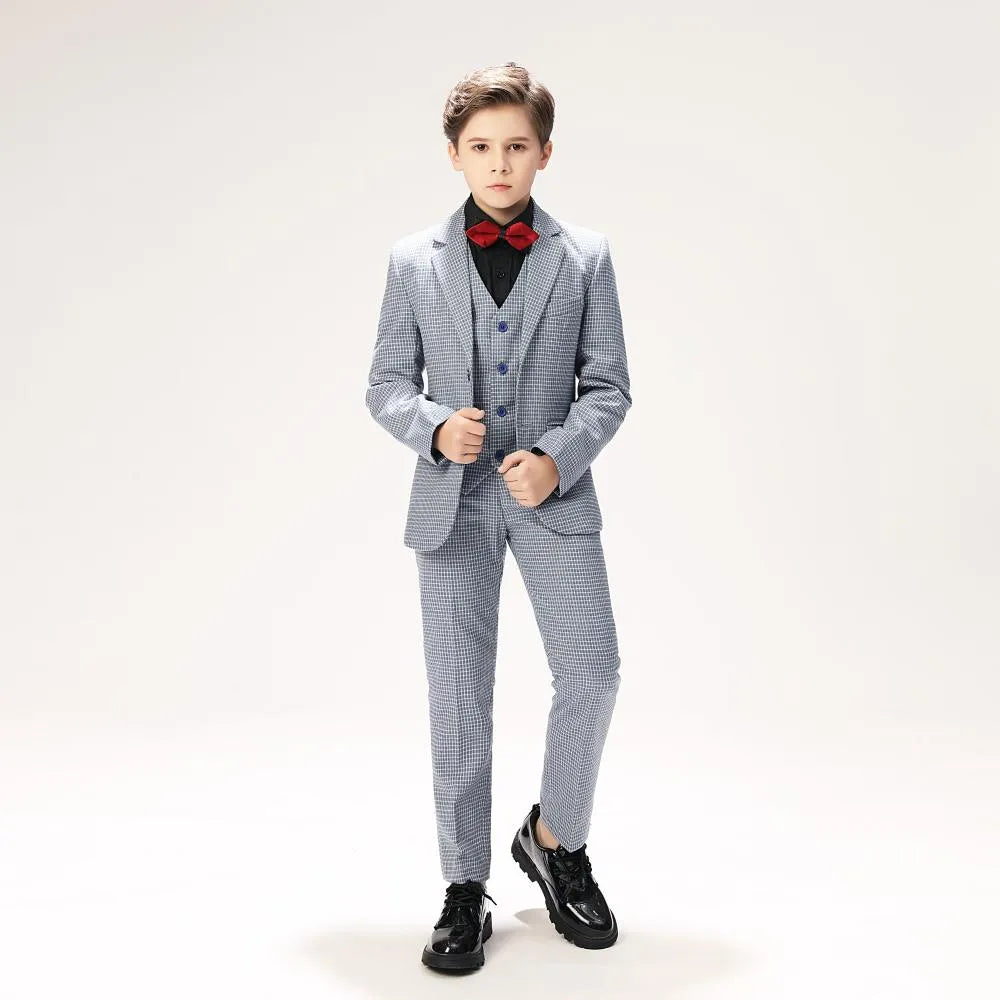 Elegant plaid boys' prom suit with black shirt and red bow tie, full body view