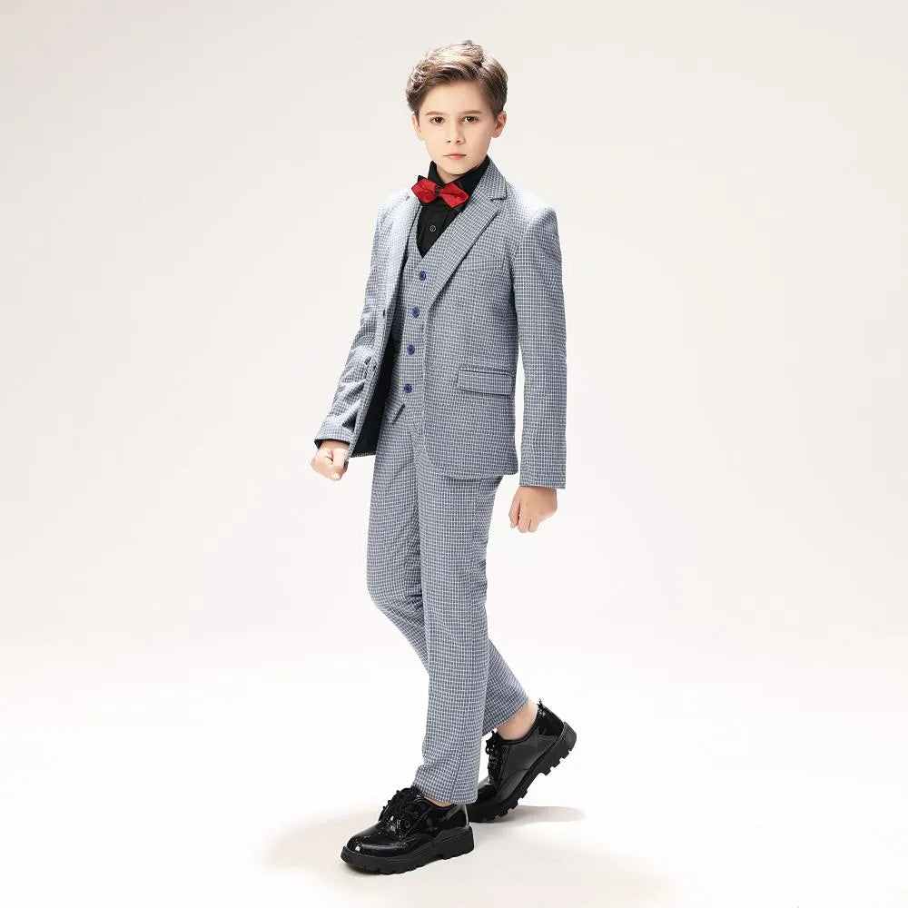 Side view of black and white plaid ring bearer suit for boys, 5-piece formal set with blue buttons