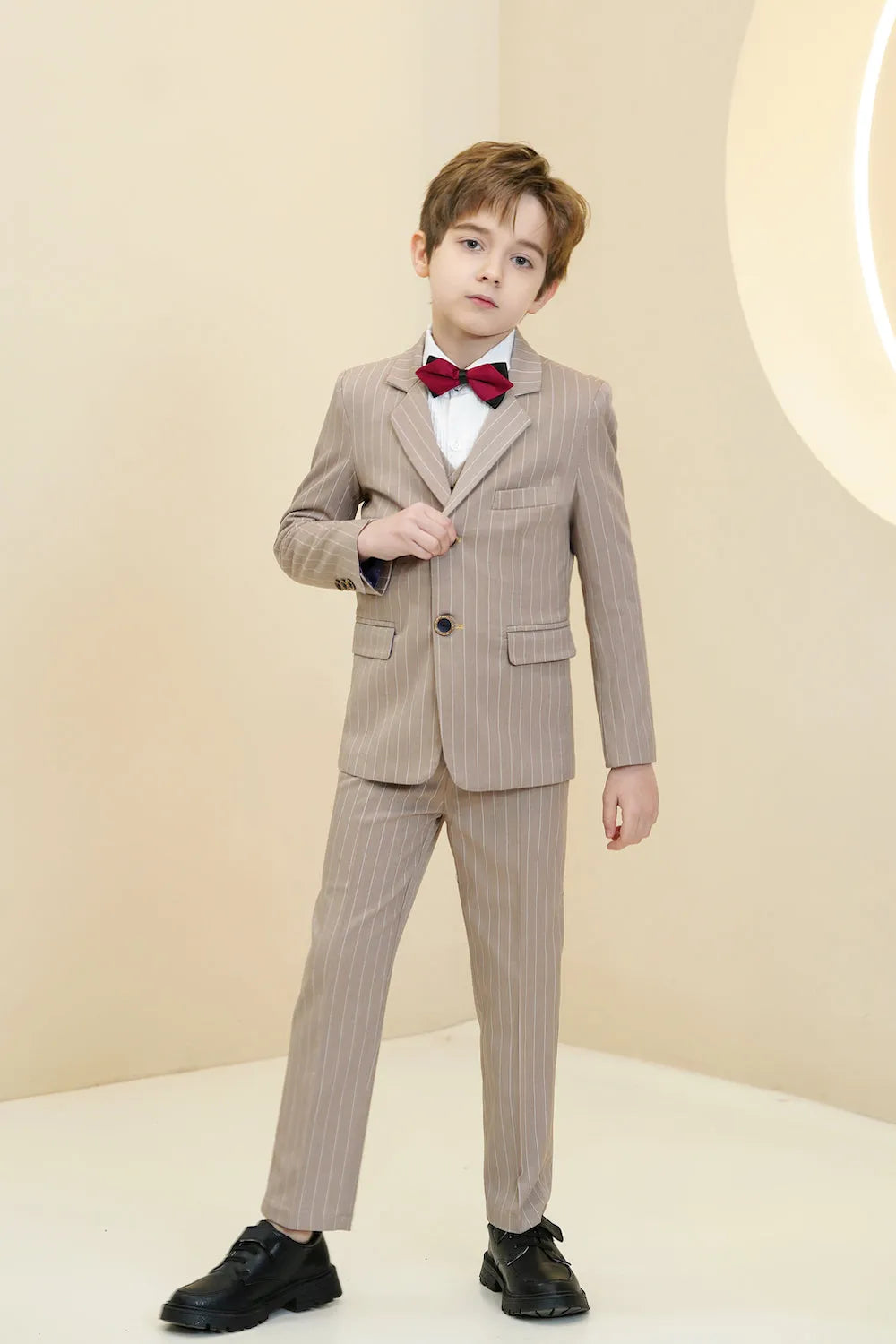 Khaki striped 5-piece boy's suit with blazer, pants, vest, shirt, and bow tie for weddings