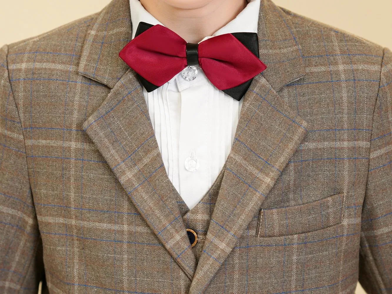 Khaki plaid boys suit: Close-up of red bow tie & checked collar detail