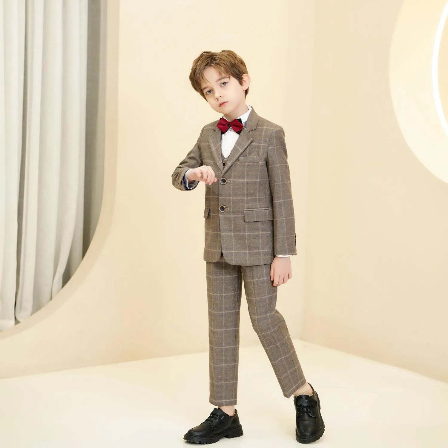 Khaki plaid boys 5-piece suit: Side pose with red bow tie & button detail