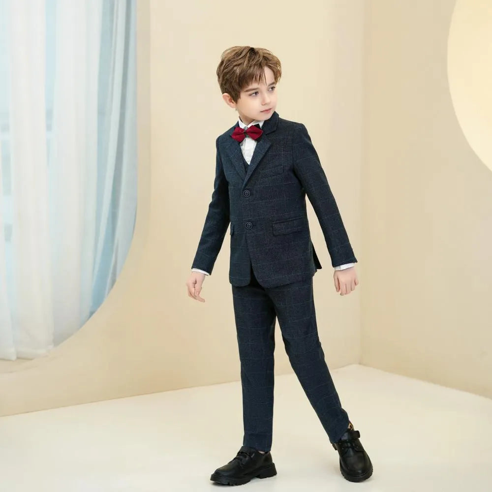 Navy plaid boys 5-piece suit: Side view with red bow tie & elegant formal style