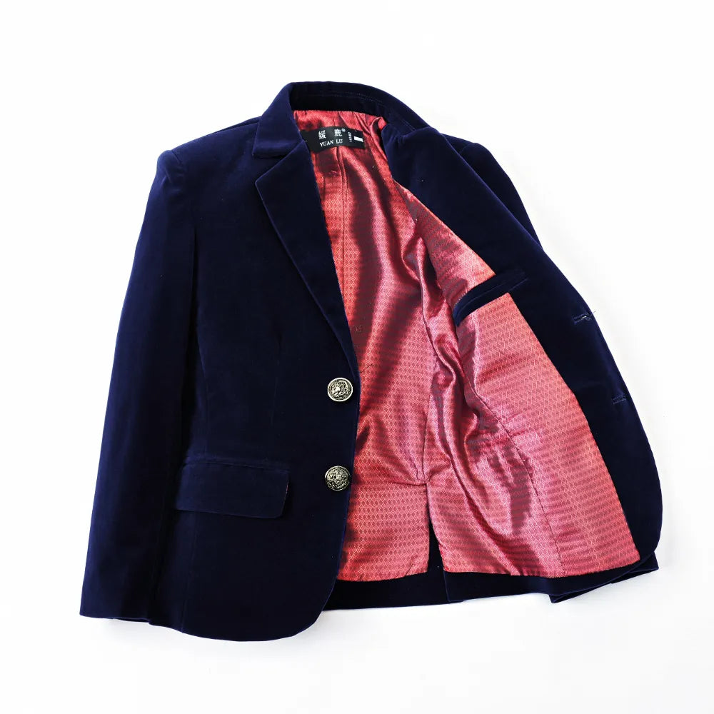 Inside view of boys navy velvet blazer featuring red satin lining and interior pocket, ideal for school or formal parties.