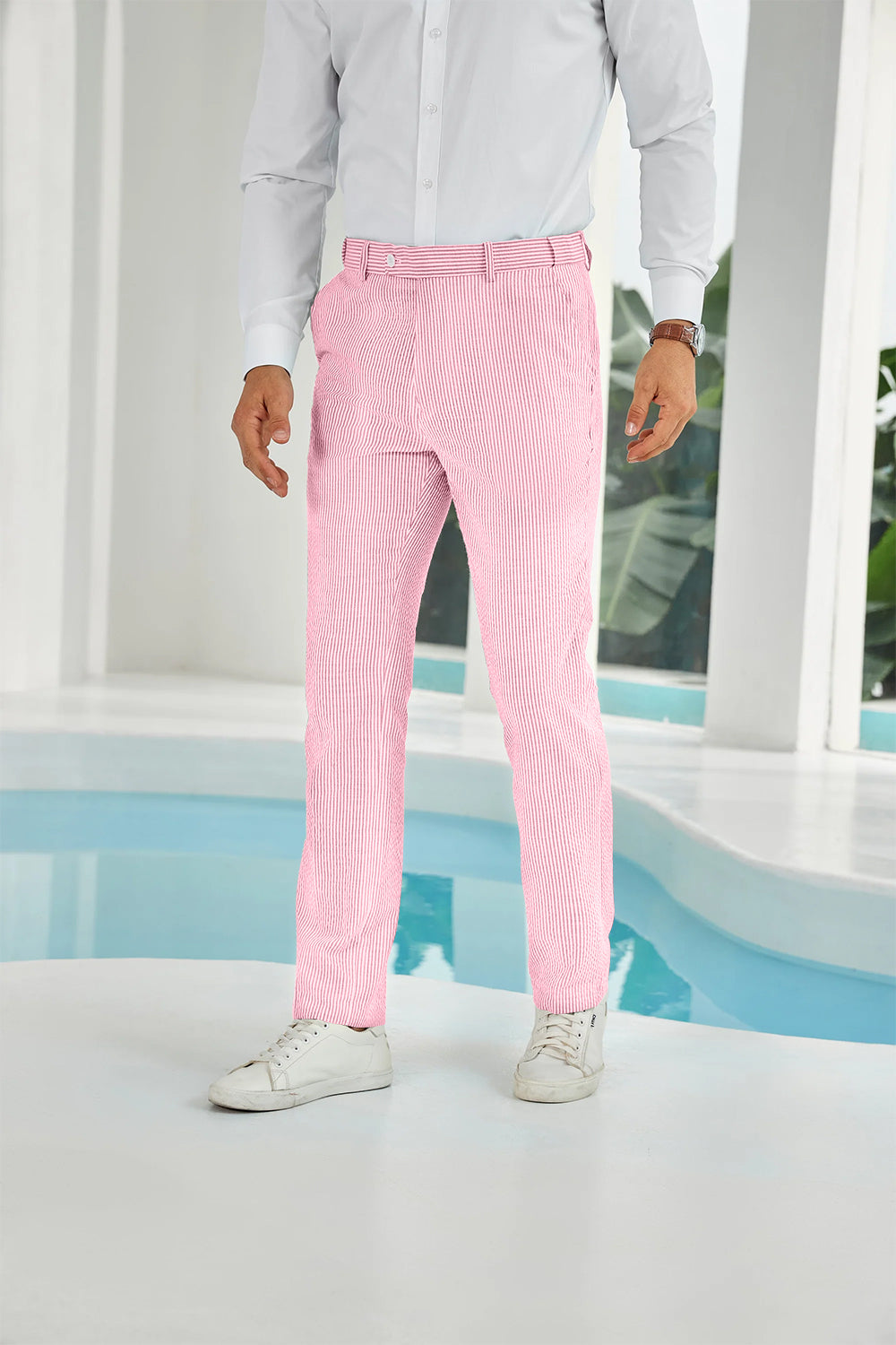 Front view of pink seersucker pants with subtle stripes and white shirt