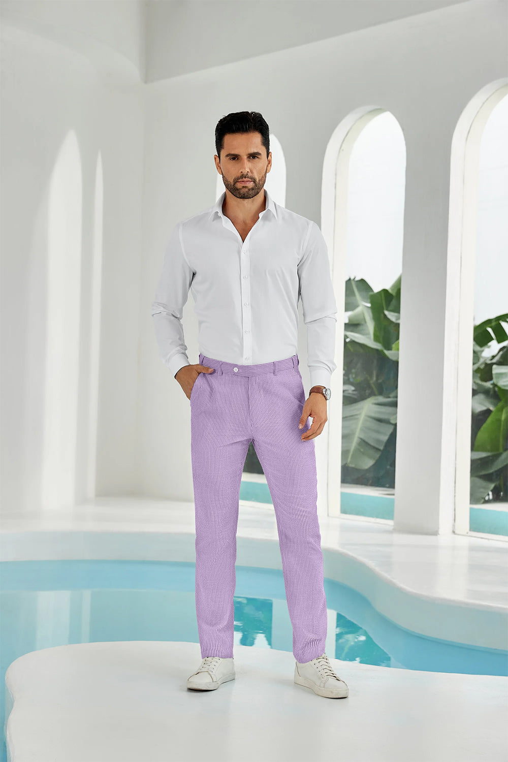 Full-body look: man in purple seersucker pants, white shirt, and sneakers