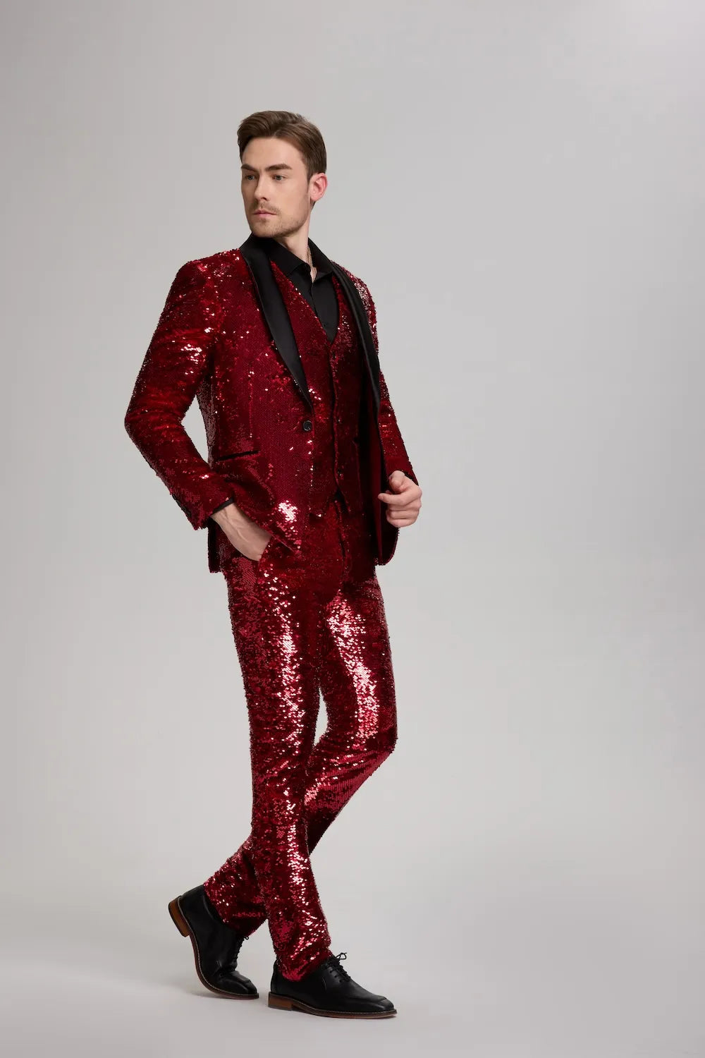 Side profile of slim fit red sequin tuxedo for men, showing tailored silhouette.