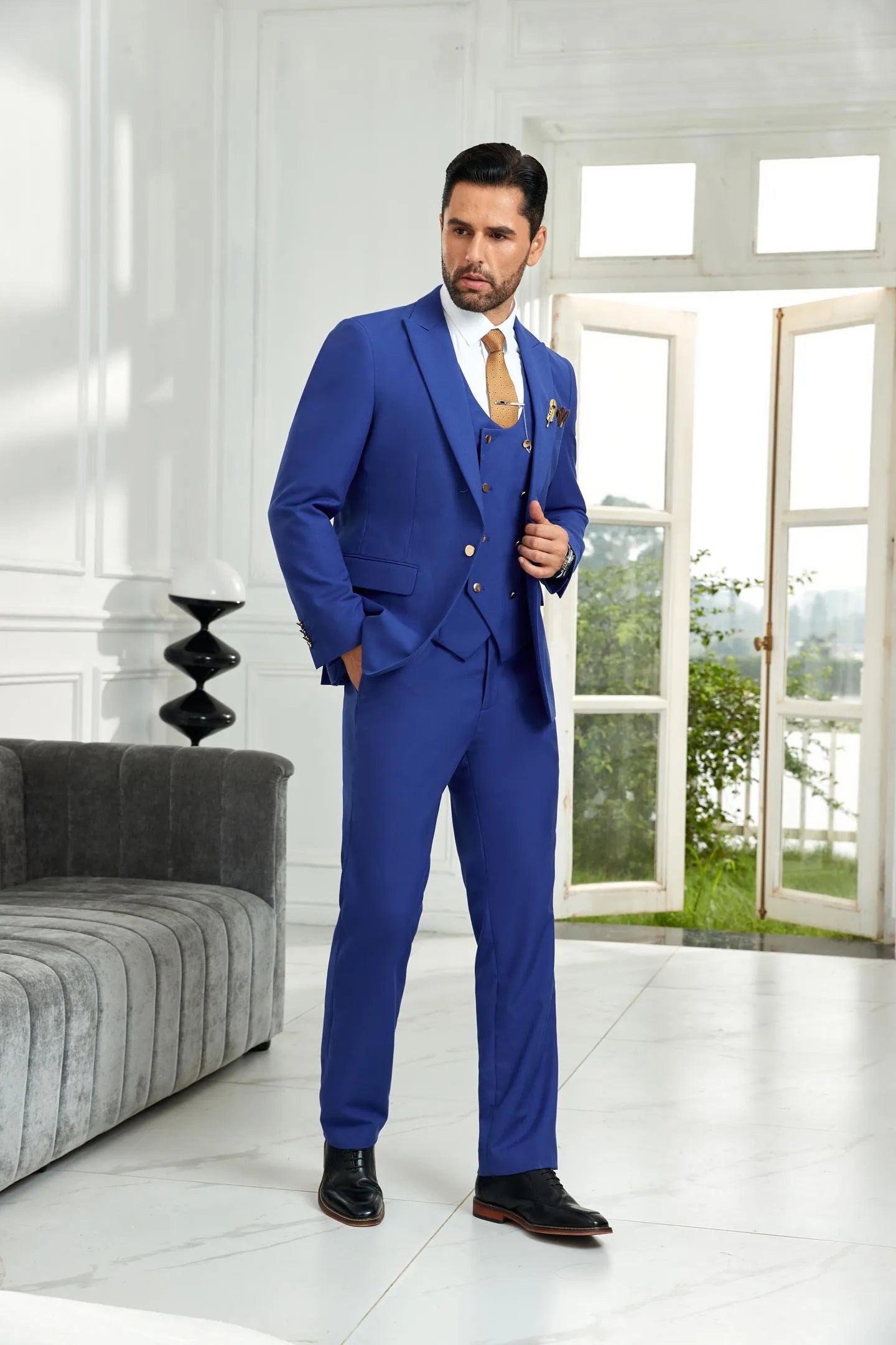 Front view of royal blue tailored 3 piece men's suit with designer blazer and matching vest, styled for wedding and office formals.