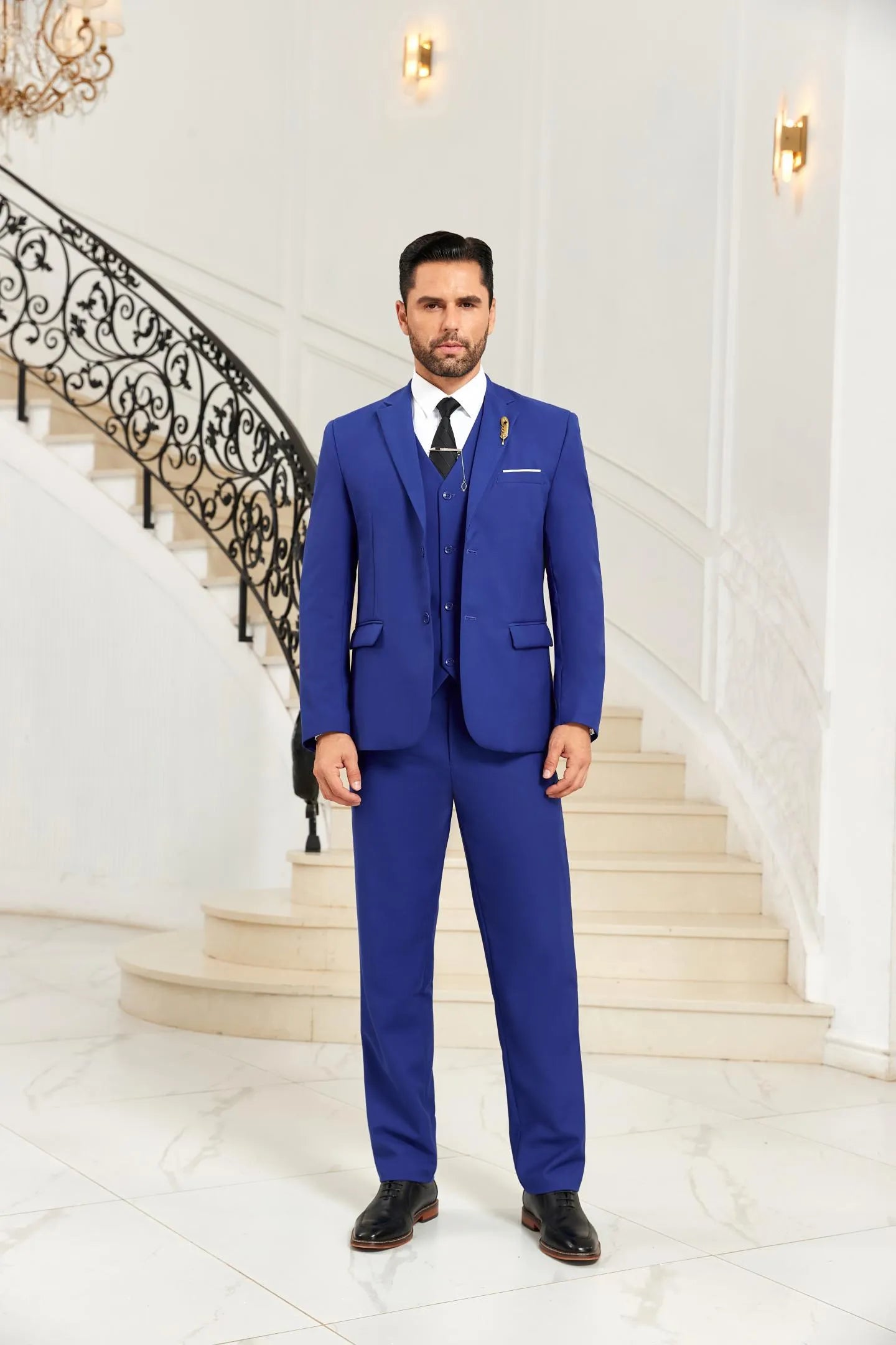 Front view of blue 3 piece men's suit featuring modern blazer, vest, and trousers, perfect for wedding and formal events