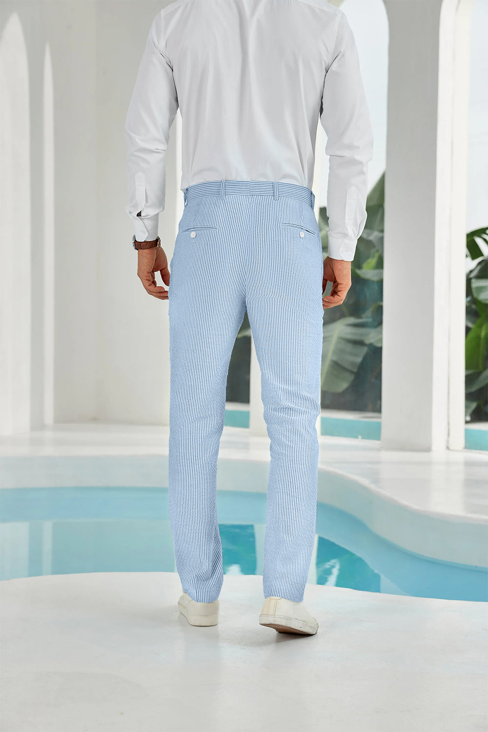 Back view showing rear pockets on sky blue striped seersucker pants