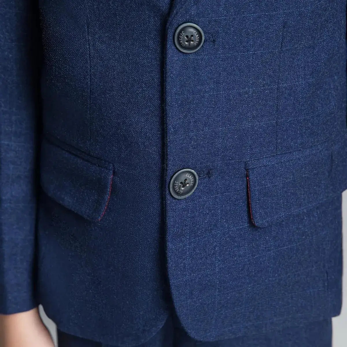 Blazer button and pocket detail of navy check suit – premium plaid suit for kids formal events