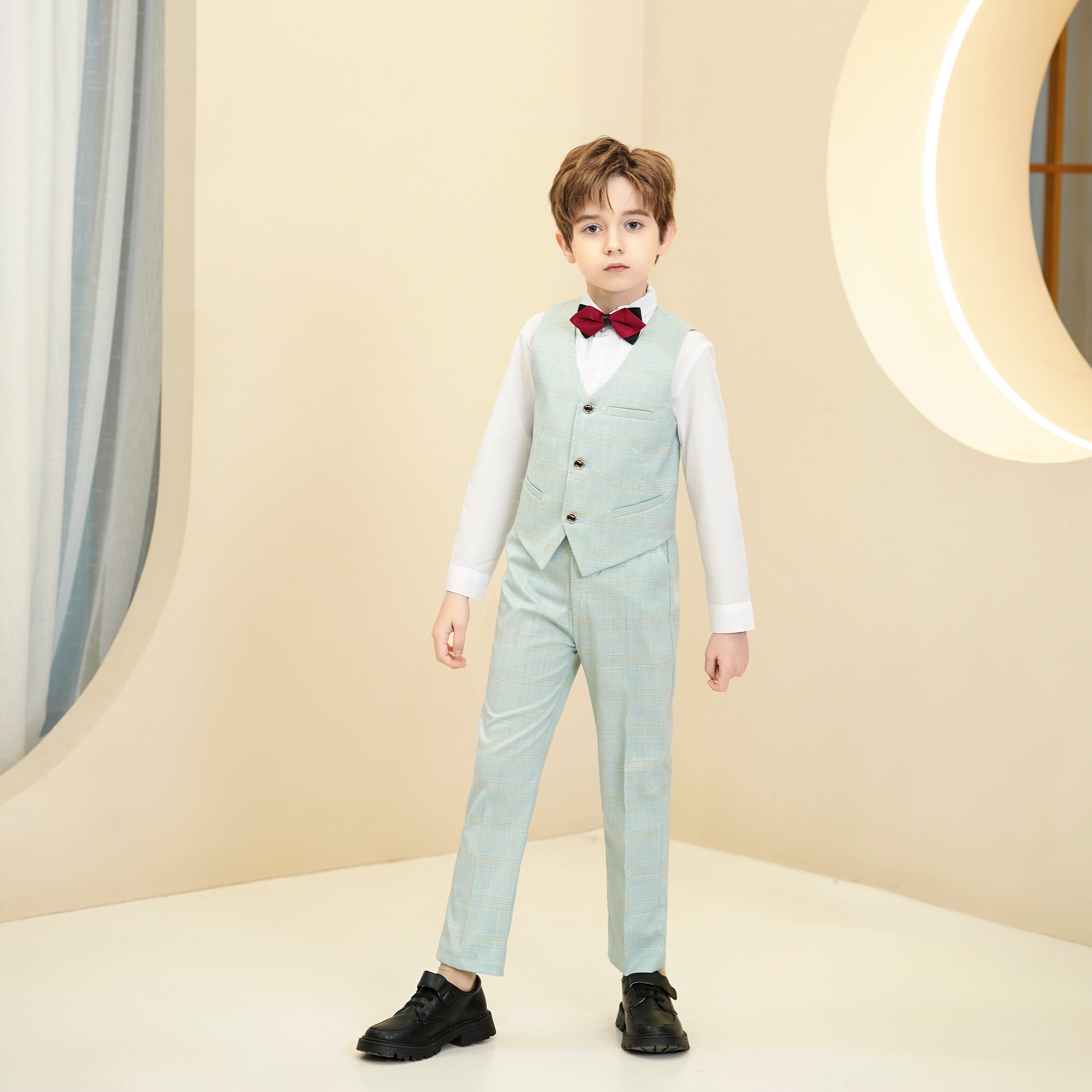Formal boys mint green suit with plaid pattern and red bow tie for party occasions