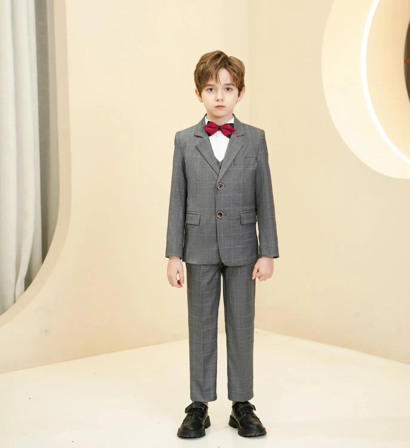 Grey plaid boys 5-piece suit: Front view with red bow tie for holiday & party