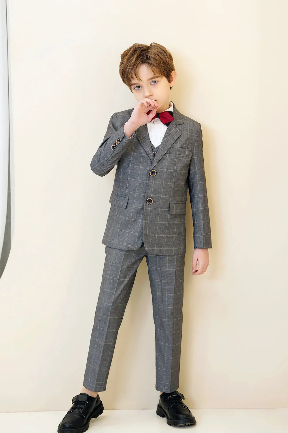 Grey plaid boys 5-piece suit: Side view with red bow tie for holiday & party