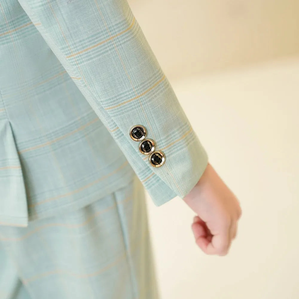 Mint green plaid boys suit: Close-up of cuff with gold-trimmed buttons & checked sleeve