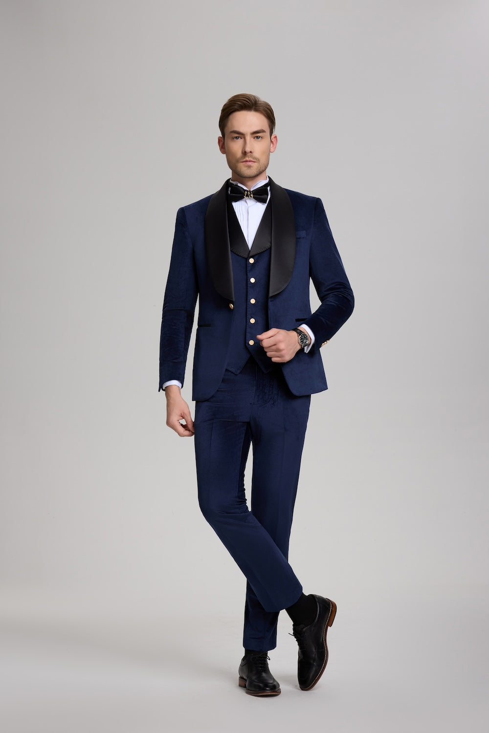 Royal blue velvet 3 piece men's suit with black shawl collar and gold buttons, refined formal attire