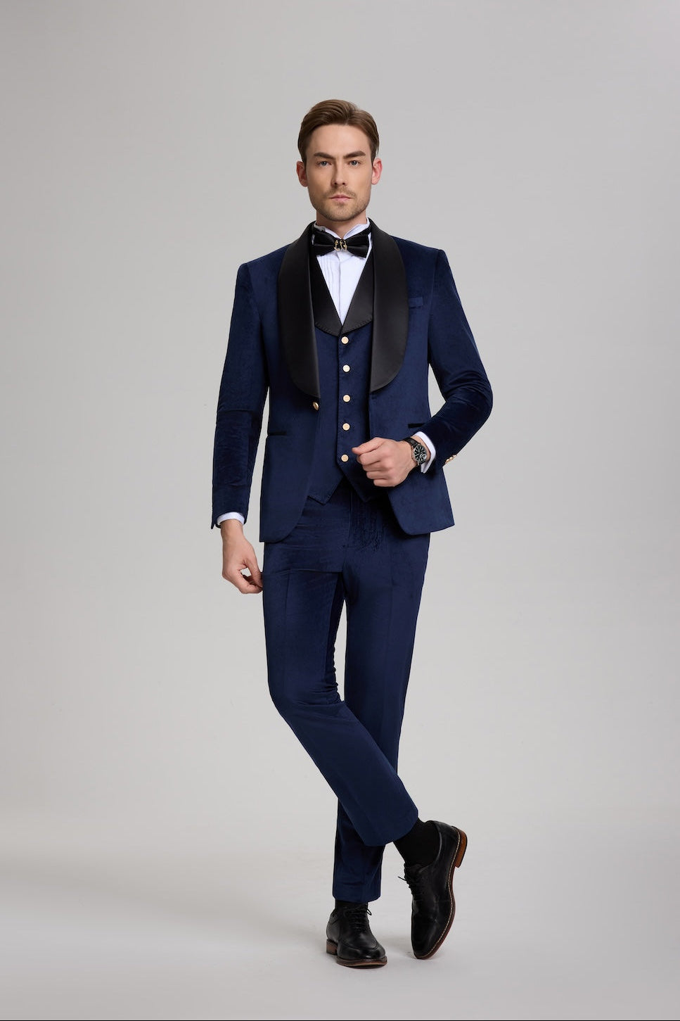 Royal blue velvet 3 piece men's suit with black shawl collar and gold buttons, refined formal attire