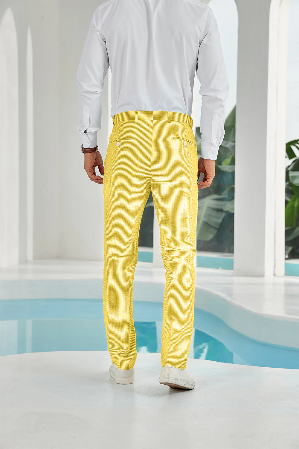 Back view showing rear pockets on yellow striped seersucker pants