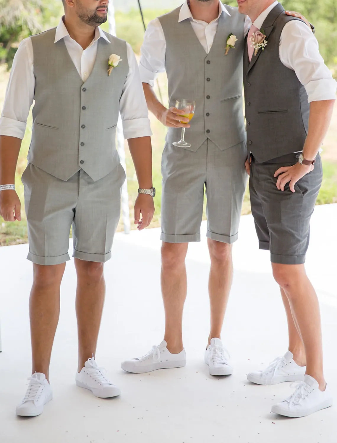 group of men wearing gray linen vest & shorts suits – stylish summer wedding attire