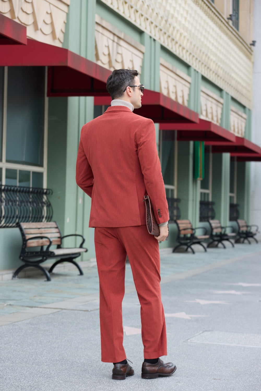 Back view of red corduroy 2 piece suit – tailored fit with visible seam detail