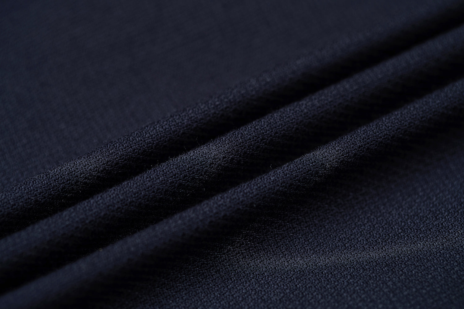 Men's navy double breasted blazer fabric - soft textured weave formal jacket material close-up
