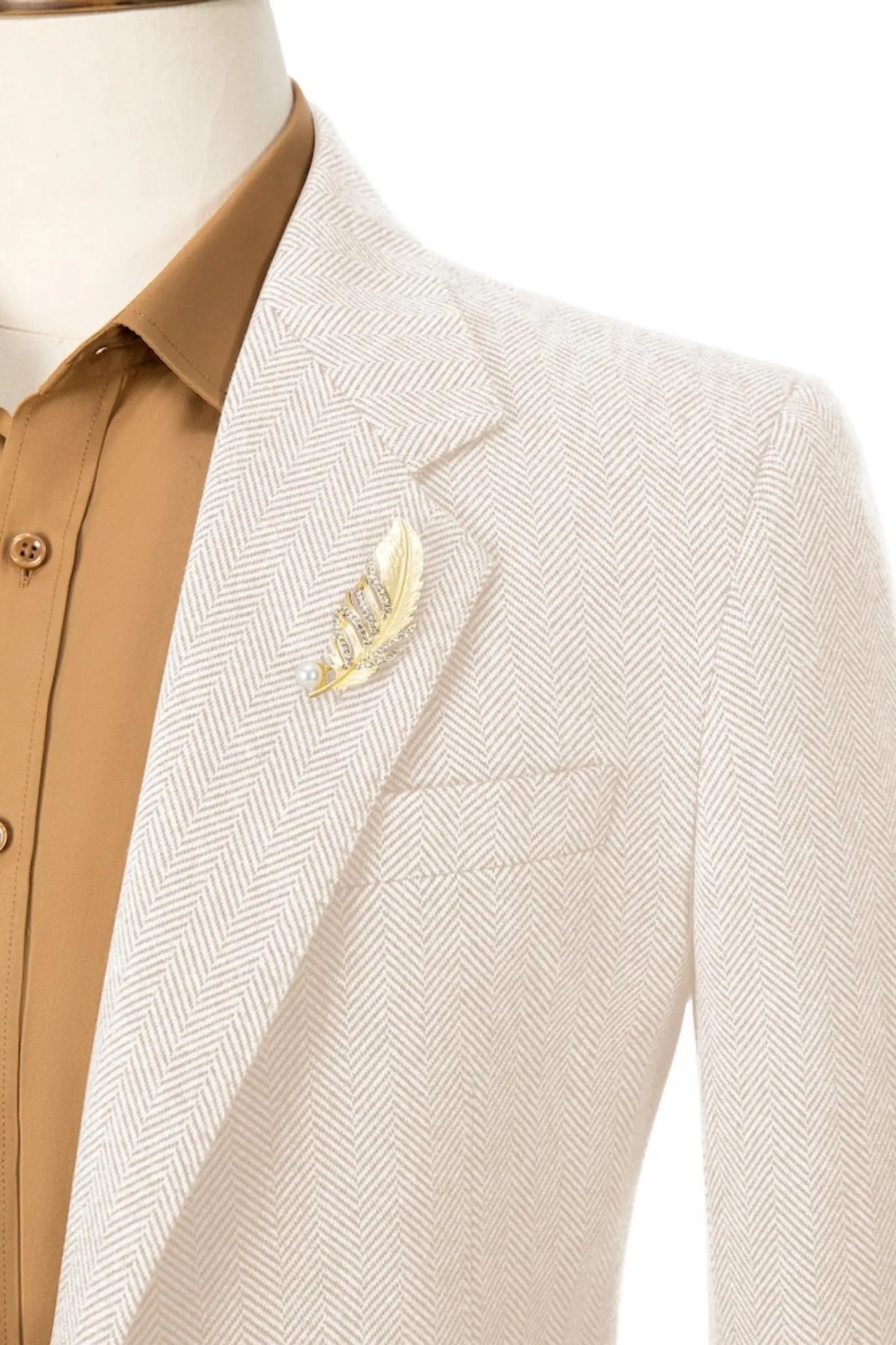 Close-up of collar on men's beige herringbone business suit – emphasizing refined classic details