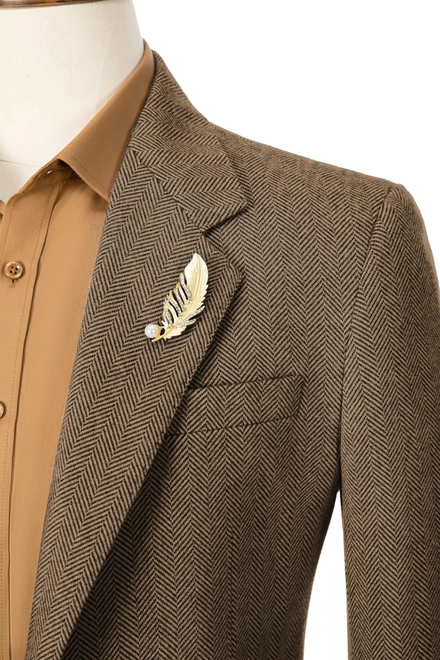 Close-up of the collar on men's brown herringbone business blazer – highlighting refined craftsmanship and design