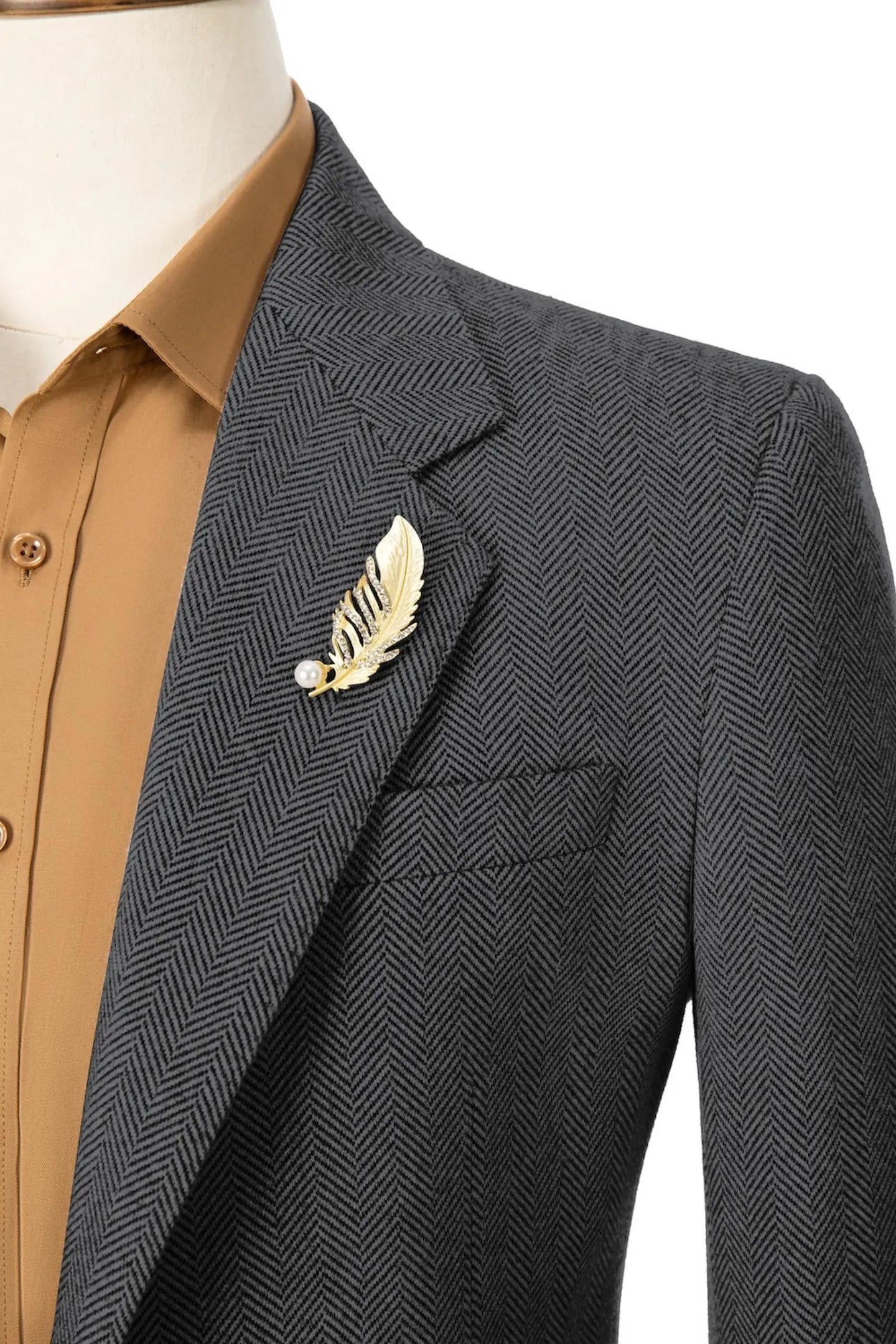 Close-up of collar on men's dark grey herringbone business blazer – emphasizing refined craftsmanship